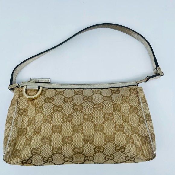 Gucci Handbags - Gucci Beige Metallic Gold leather trim Canvas GG monogram Abbey D Ring Pouchette